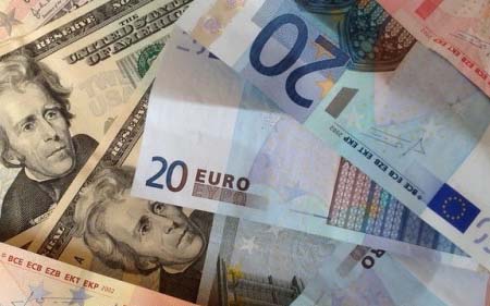 The euro fell below the dollar today for the first time in 20 years